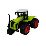 Poľnohospodársky traktor s prívesmi na pole 